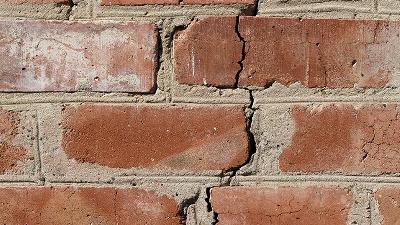 stylized cube design featuring blue and gray patterns representing modern architecture and creativity with an emphasis on 15 unique shapes and colors